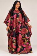 Burgundy and pink floral Kaftan dress against a neutral background
